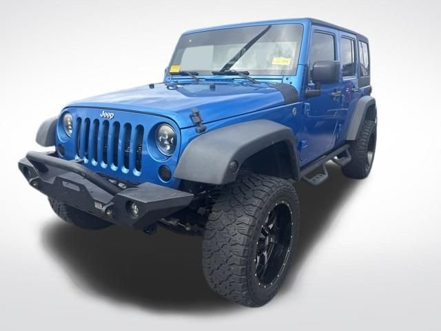 Used 2015 Blue Jeep Unlimited Sport image 1