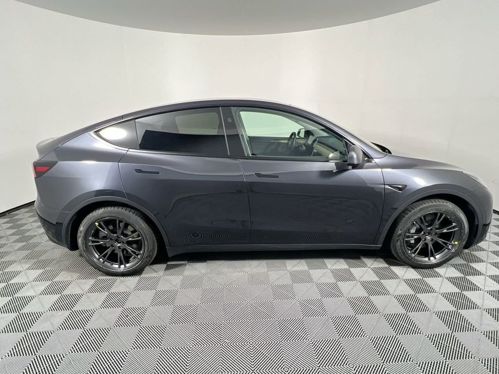 Used 2025 Tesla Model Y Long Range with VIN 7SAYGAEE8SF284459 for sale in Clermont, FL