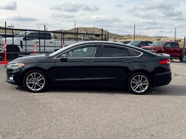 Used 2020 Ford Fusion Hybrid Titanium with VIN 3FA6P0RU1LR113199 for sale in Castle Rock, CO