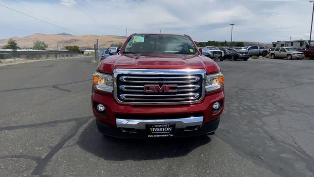 Used 2016 COPPER RED METALLIC GMC 4WD SLT image 3