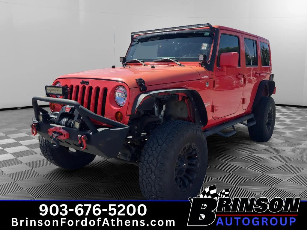 Used 2013 Rock Lobster Clearcoat Jeep Sahara image 1