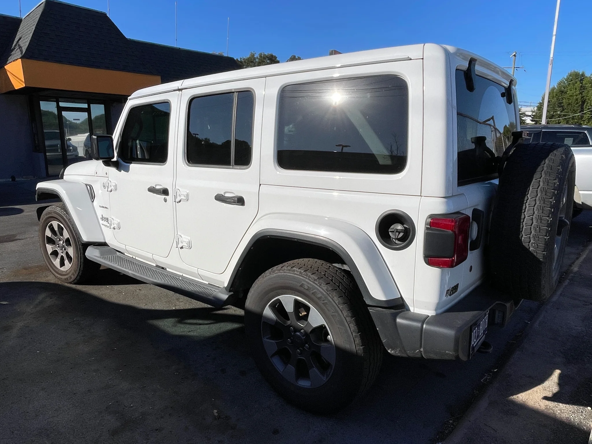 Used 2018 Bright White Clearcoat Jeep Sahara image 4