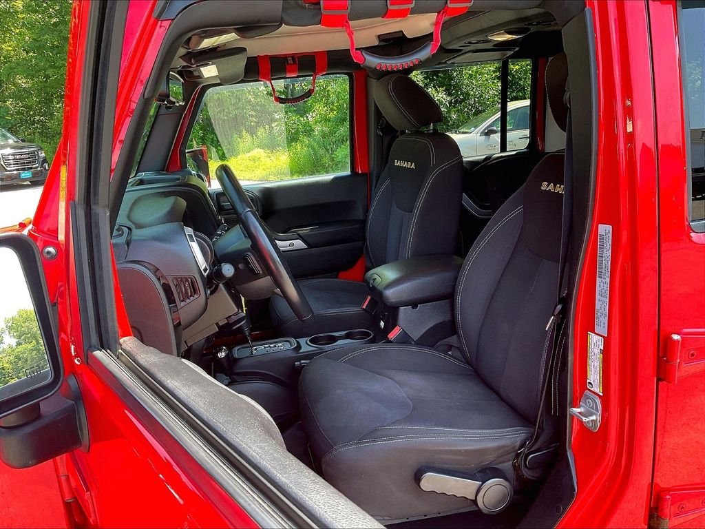 Used 2015 Red Jeep Unlimited Sahara image 10