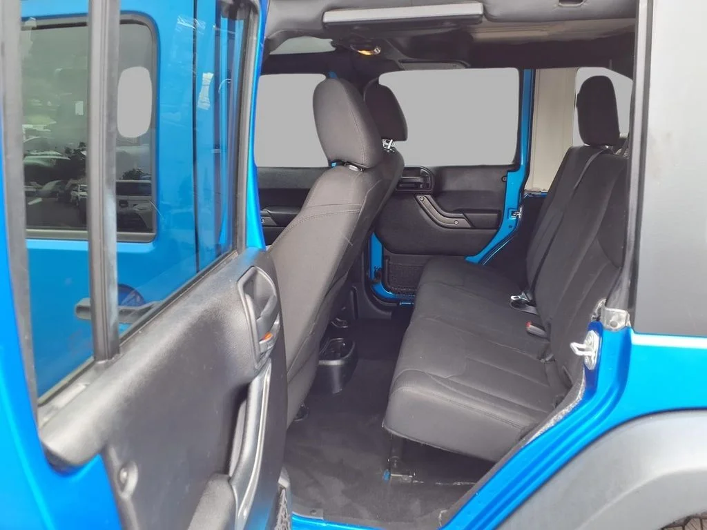 Used 2016 Blue Jeep Unlimited Sport image 24