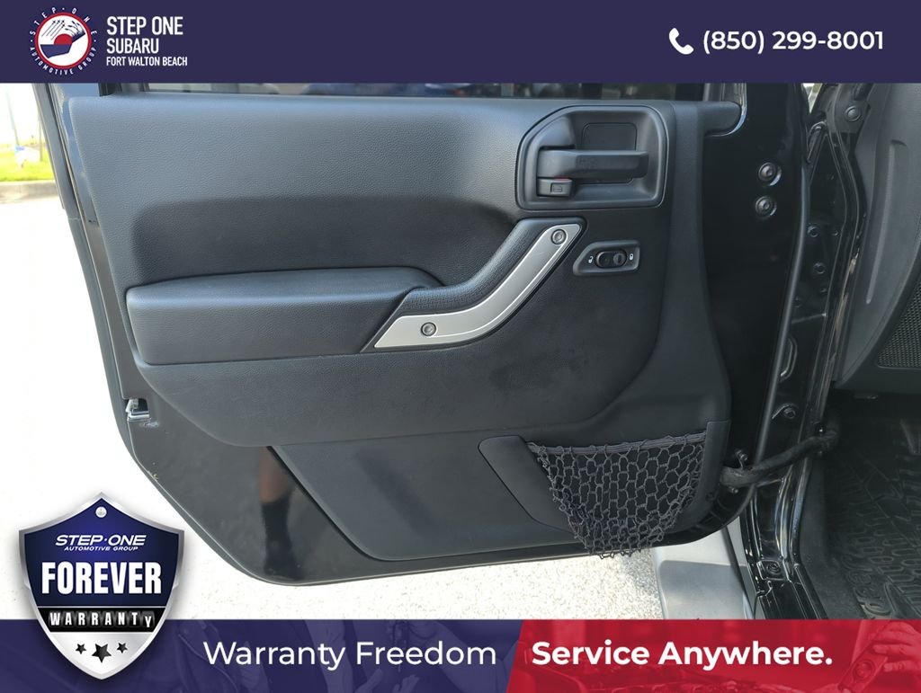 Used 2017 Black Jeep Unlimited Sahara image 18