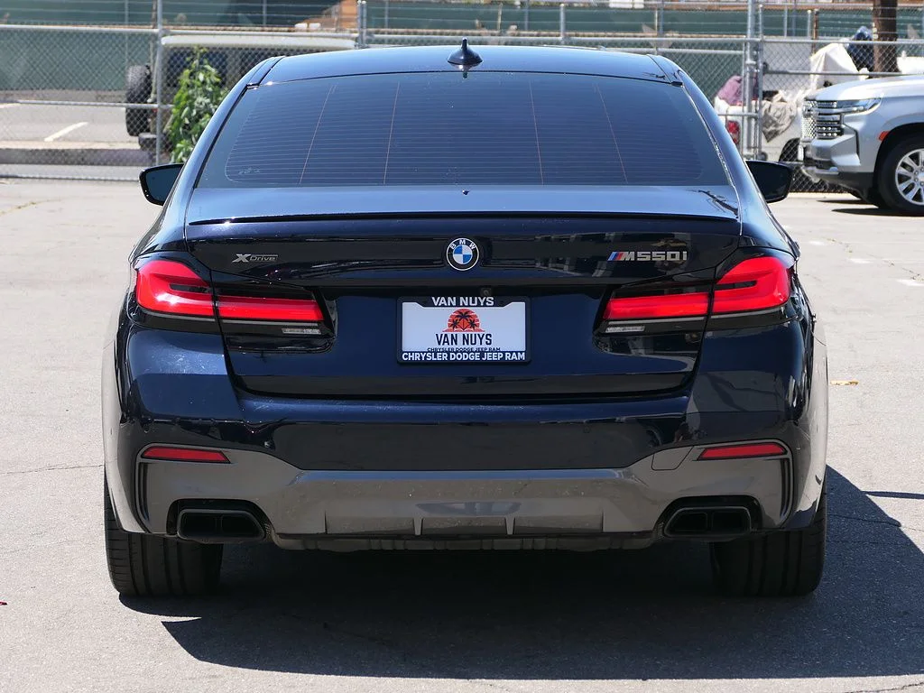 Used 2023 Carbon Black Metallic BMW M550i xDrive image 4