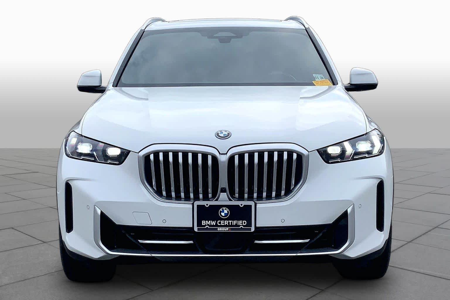 Used 2024 Mineral White Metallic BMW xDrive50e image 3