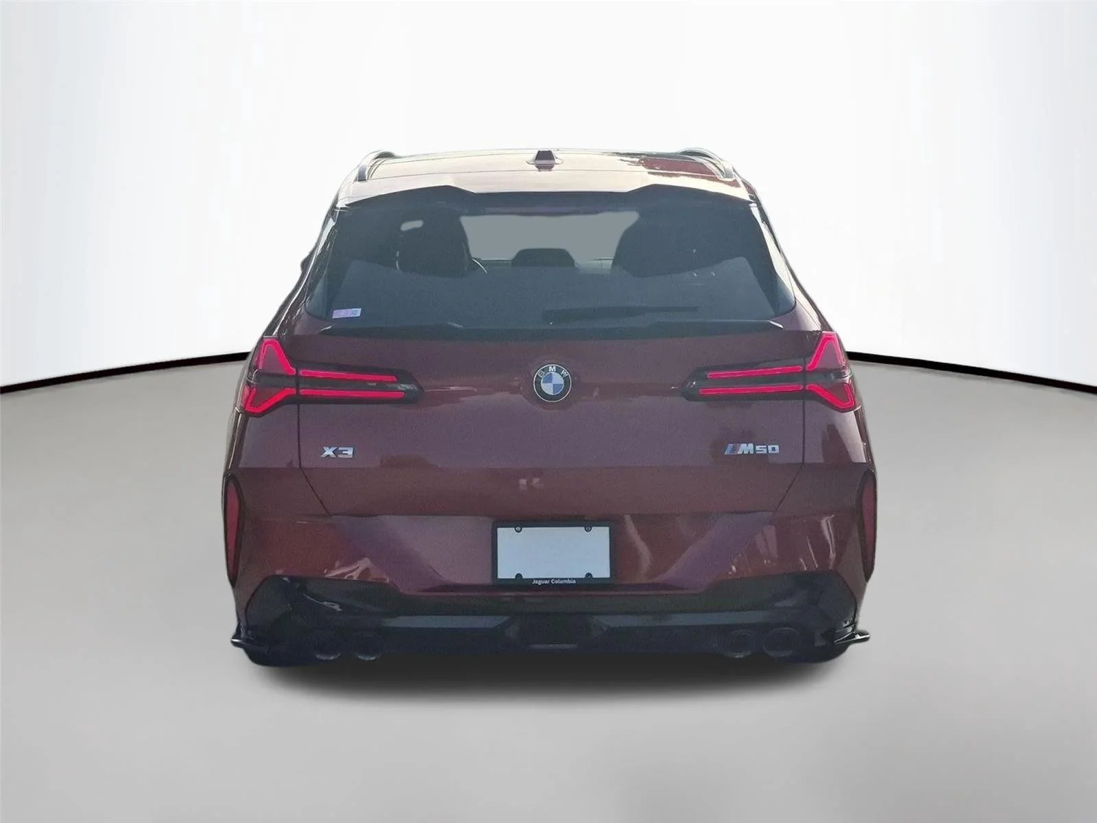 Used 2025 Vegas Red Metallic BMW M50 xDrive image 4