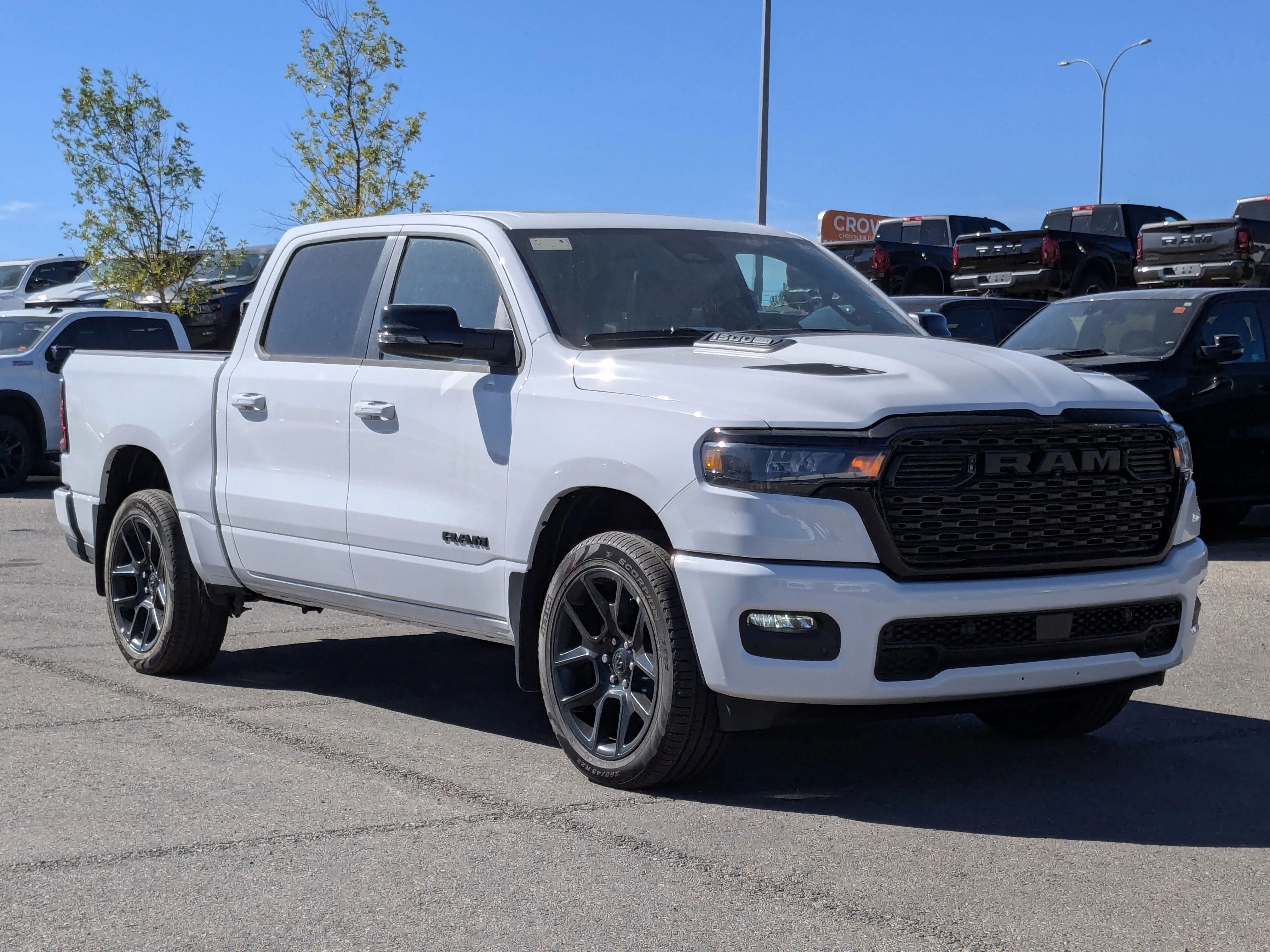 New 2025 White RAM Sport - - Night Edition - Level 1 Equip - Panoramic Sunroof & Tons more! image 2