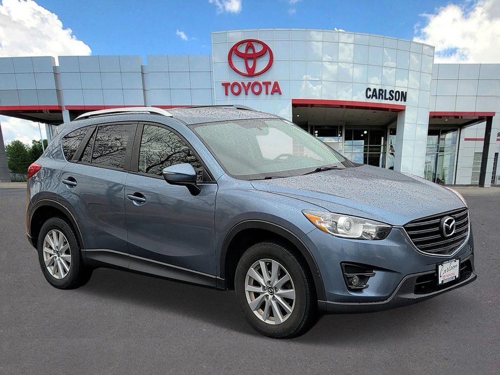 Used 2016 Mazda CX-5 Touring with VIN JM3KE4CY7G0870123 for sale in Minneapolis, Minnesota