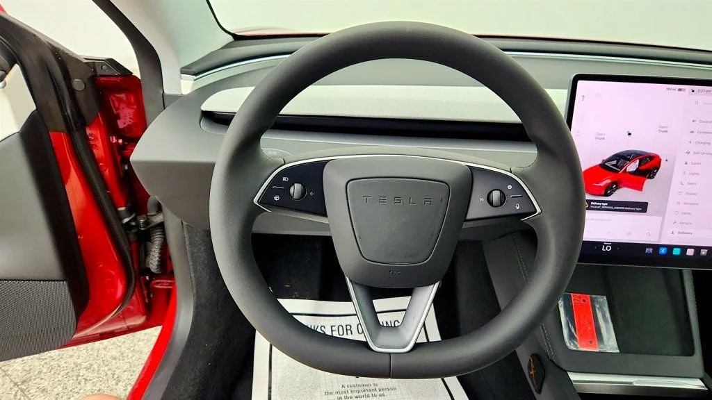 Used 2026 Ultra Red Tesla Long Range RWD w/ White & Black Premium Interior image 13