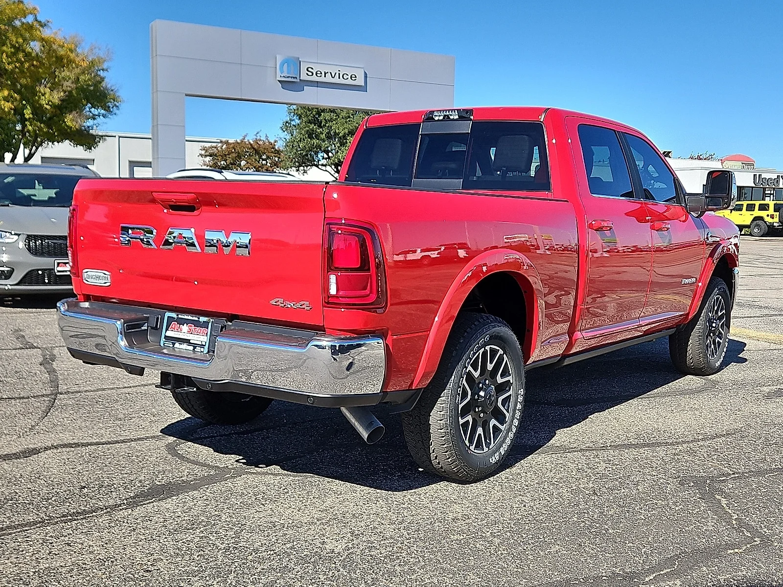 New 2026 Flame Red Ram LIMITED LONGHORN CREW CAB 4X4 6