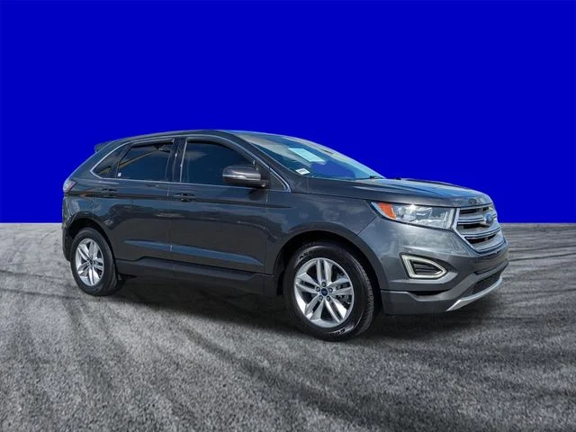Used 2016 Magnetic Metallic Ford SEL image 2