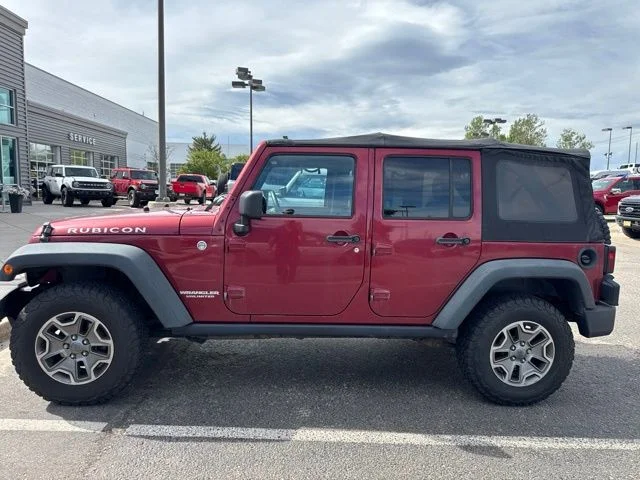 Used 2013 Red Jeep Unlimited Rubicon image 2
