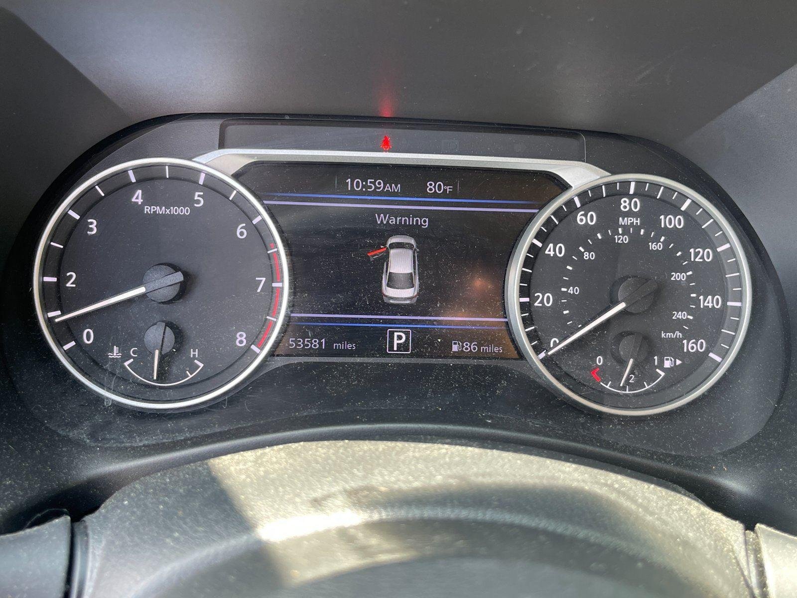 Used 2024 Gun Metallic Nissan SV image 21