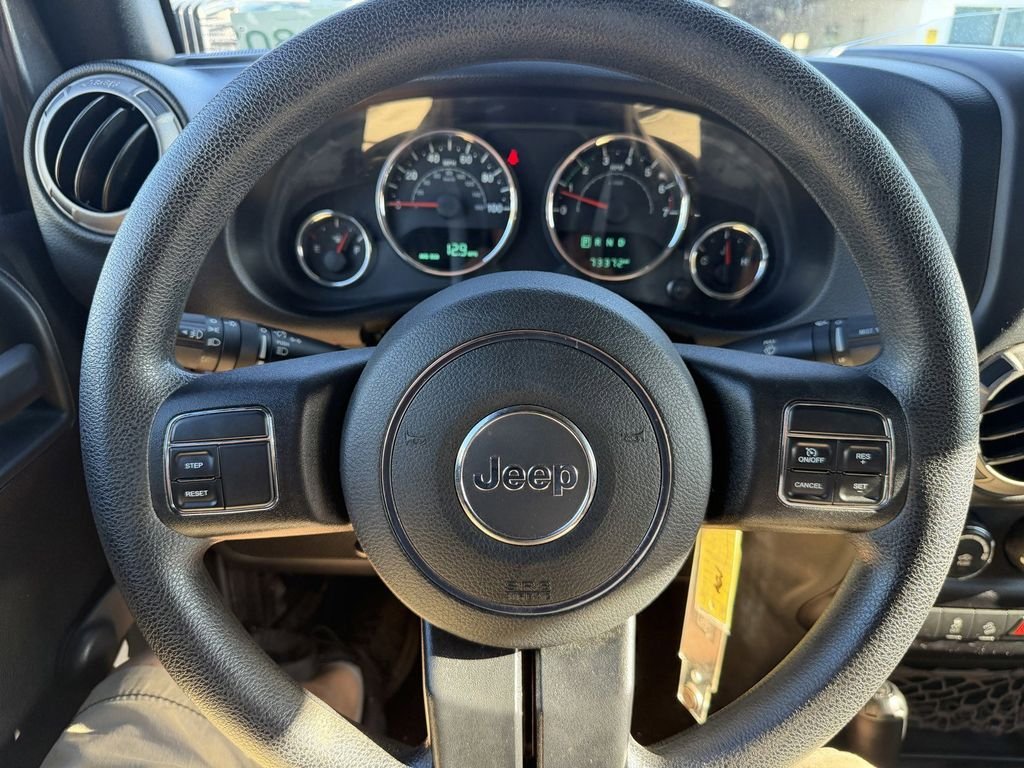 Used 2016 Granite Crystal Clearcoat Metallic Jeep Unlimited Sport image 29
