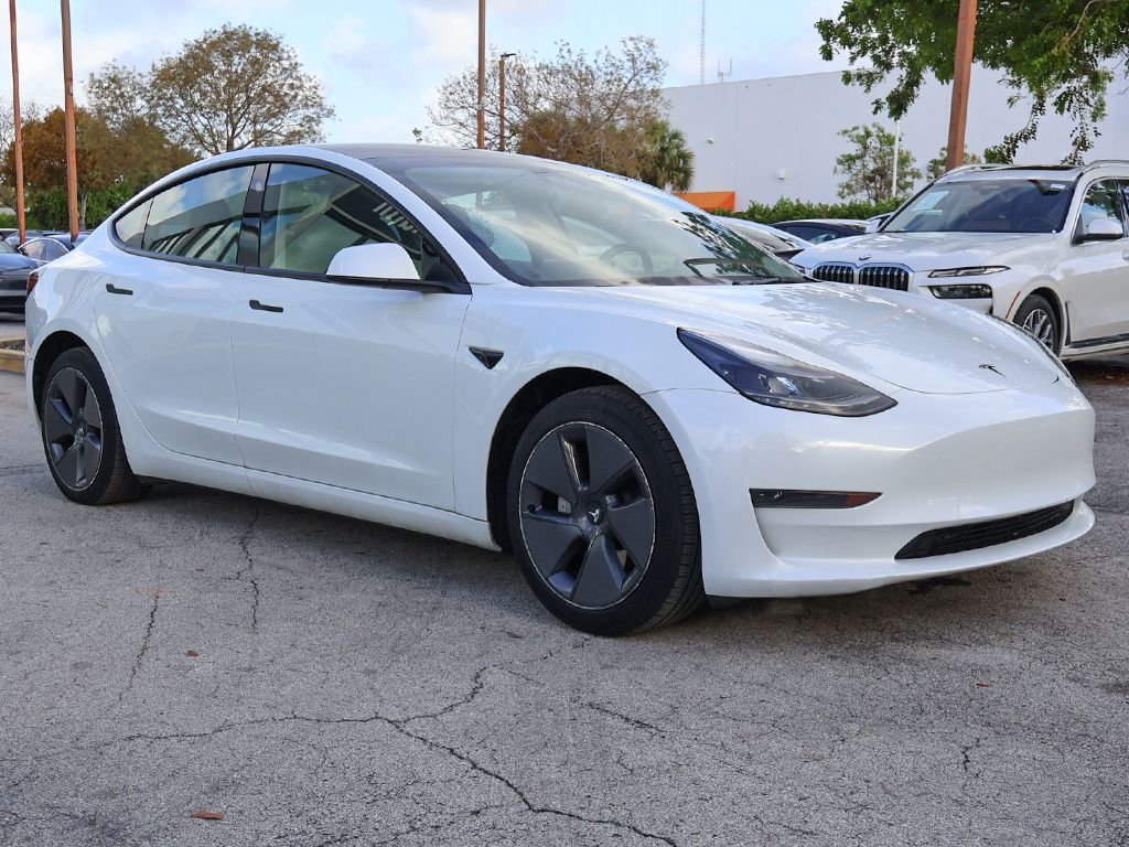 Used 2023 Tesla Model 3 Base with VIN 5YJ3E1EAXPF511989 for sale in Miami, FL