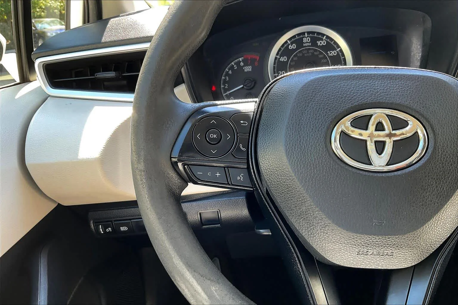 Used 2021 Super White Toyota LE image 23