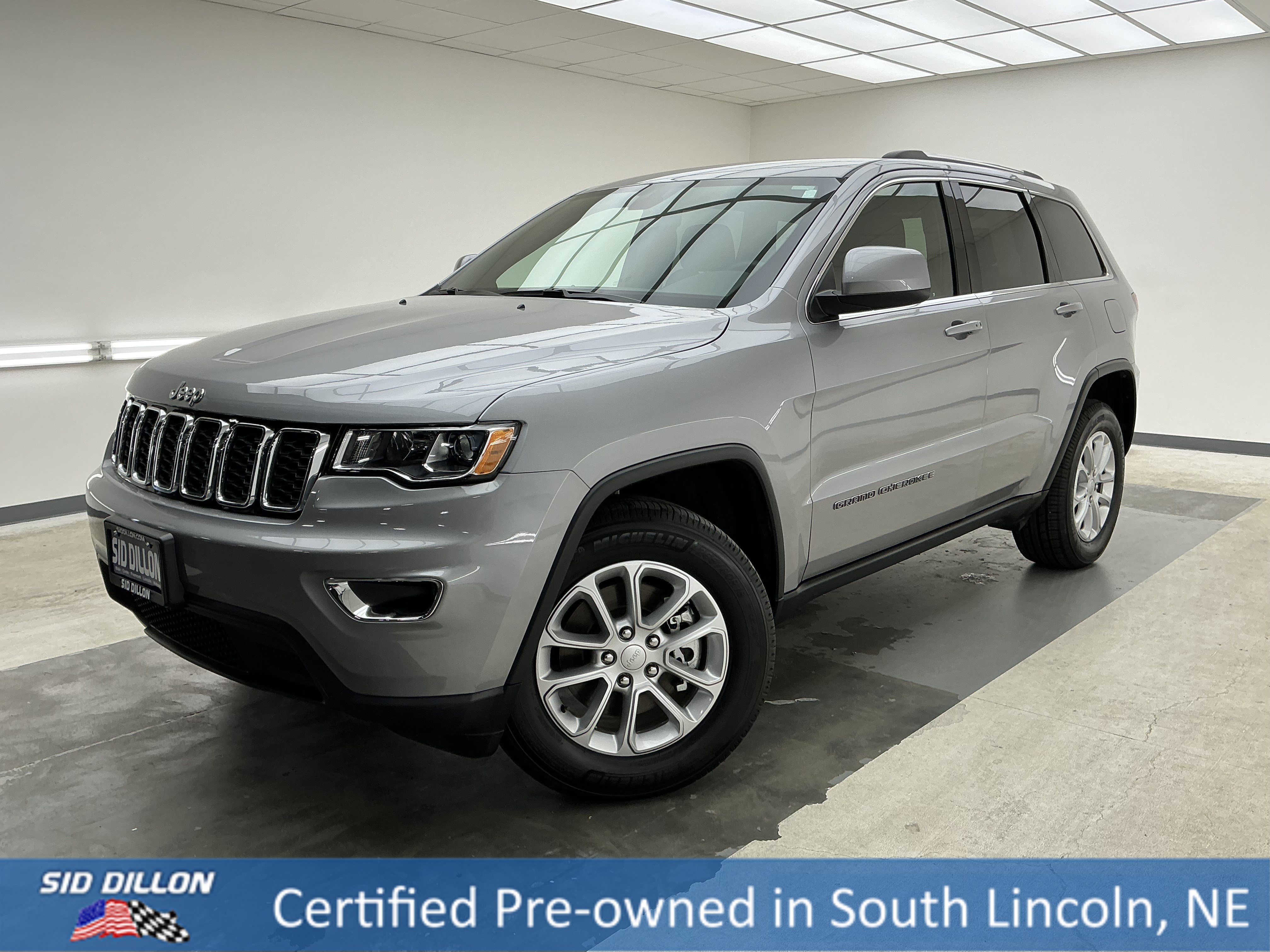 Used 2021 Billet Silver Metallic Clearcoat Jeep Laredo E image 1