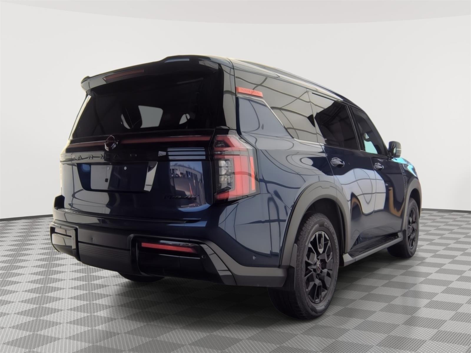 Used 2025 Deep Ocean Blue Pearl Nissan PRO-4X image 3