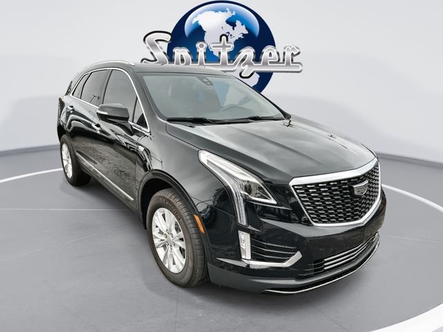 Used 2024 Black Cadillac Luxury image 1
