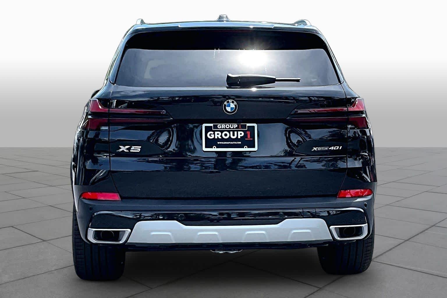 New 2026 Black Sapphire Metallic BMW xDrive40i image 4