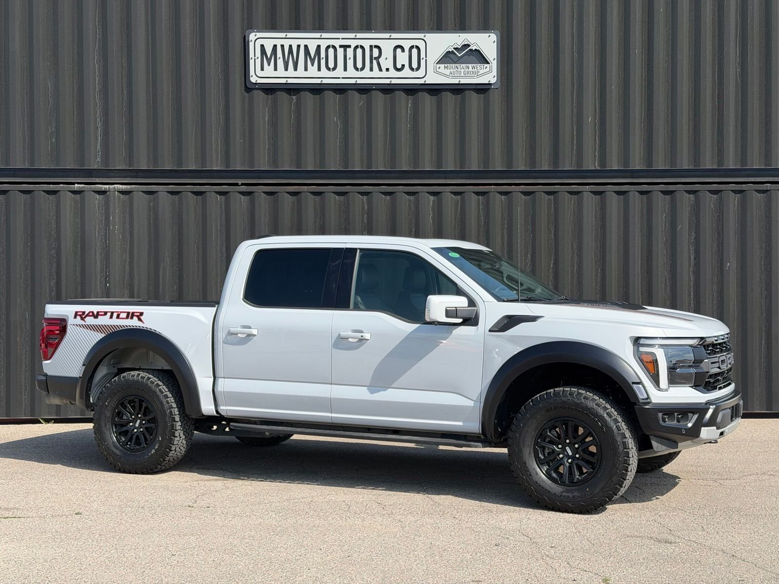 Used 2025 Space White Metallic Ford Raptor image 1