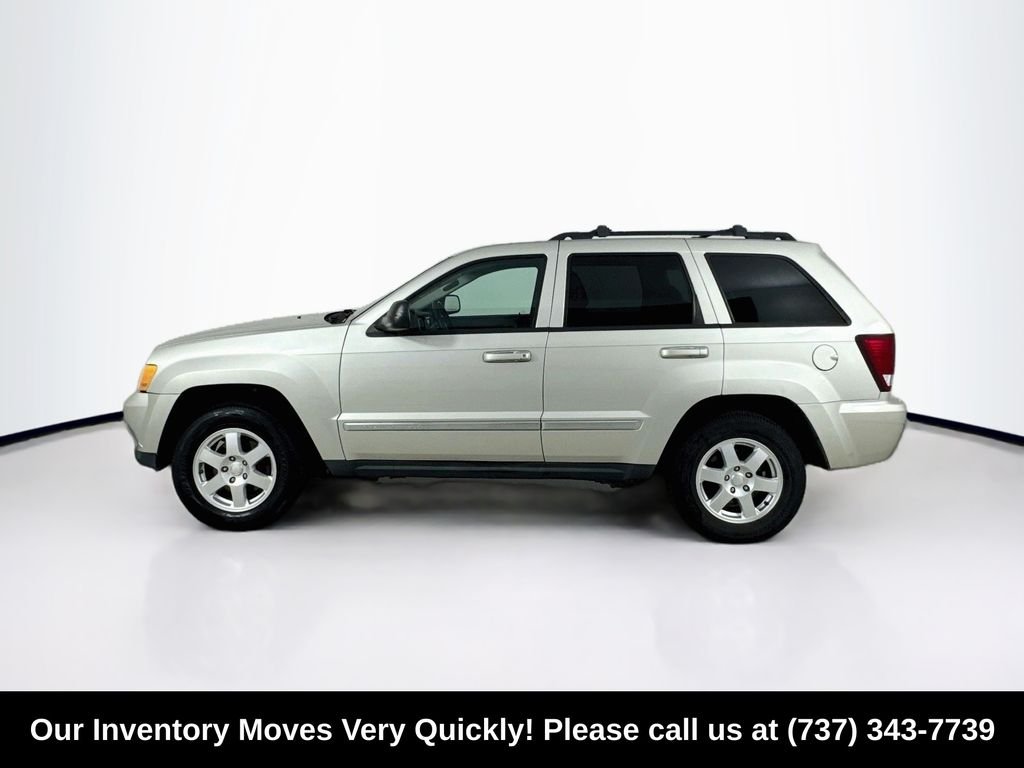 Used 2010 Light Graystone Pearlcoat Jeep Laredo image 4
