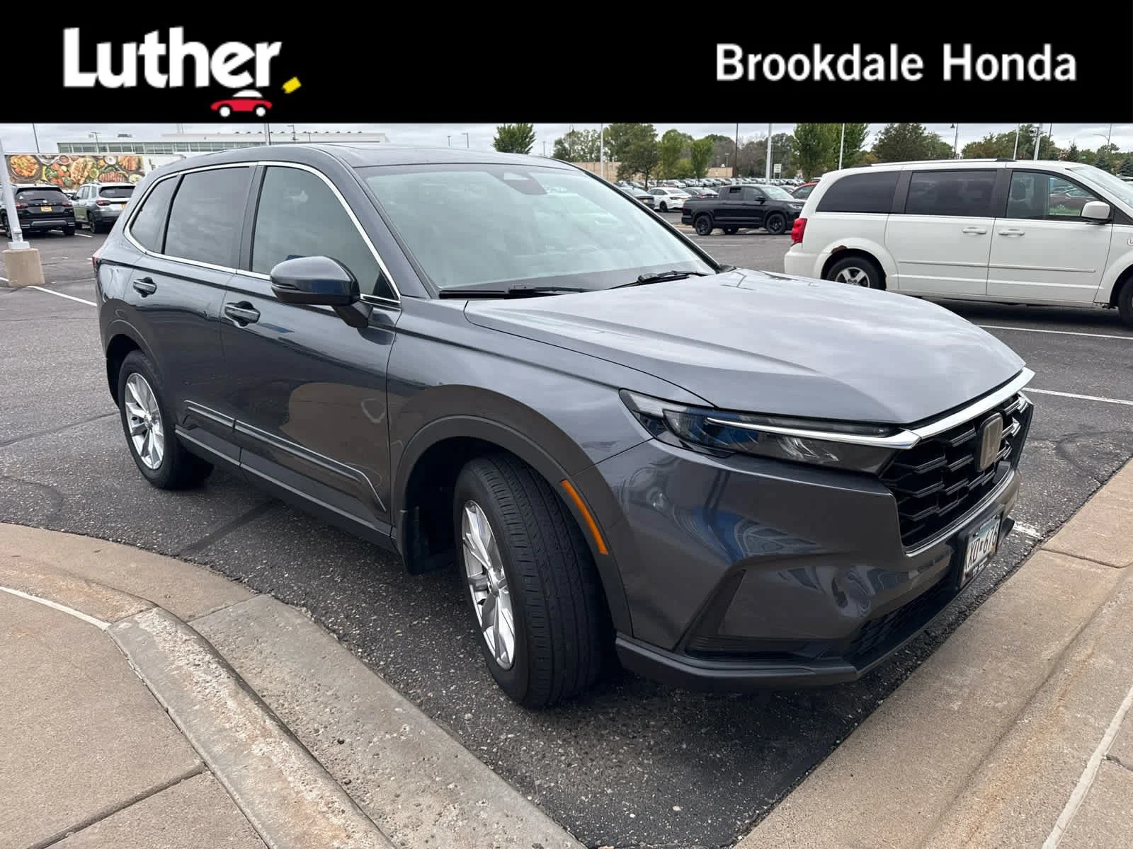 Used 2023 Meteorite Gray Metallic Honda EX image 1