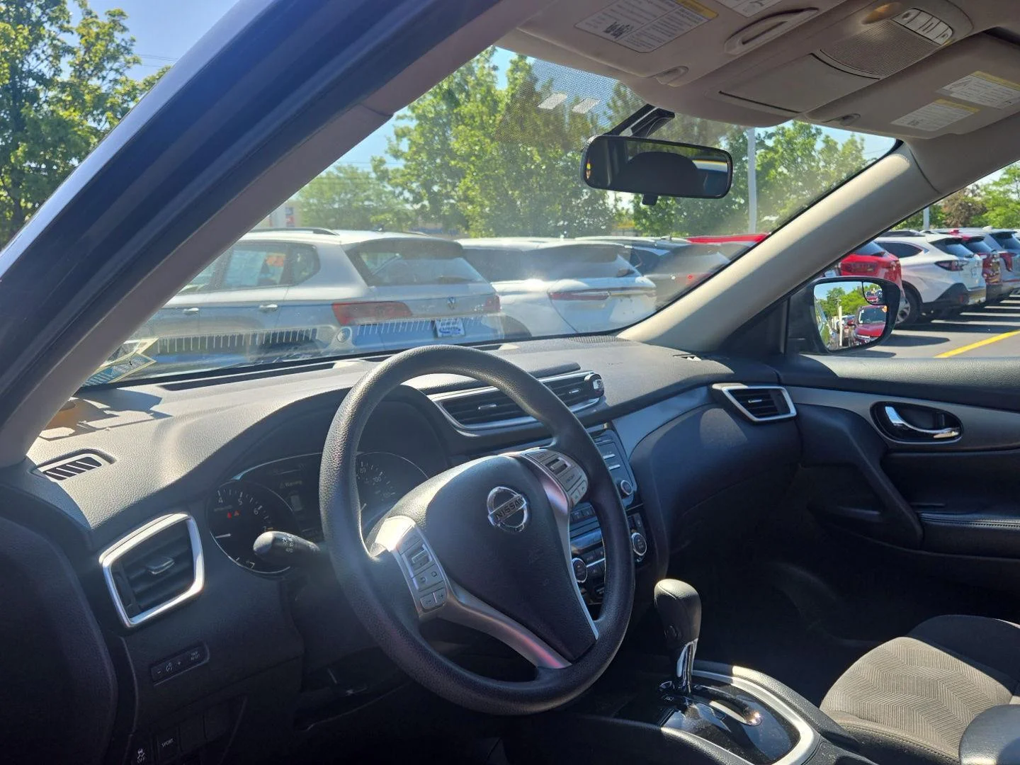 Used 2016 Magnetic Black Nissan SV image 2