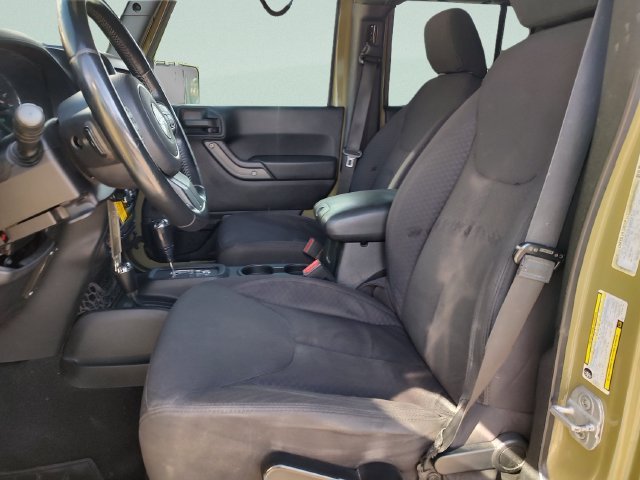 Used 2013 Green Jeep Unlimited Sport image 22