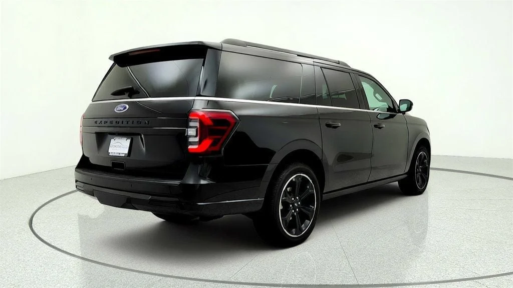 Used 2023 Agate Black Metallic Ford Limited 4x4 w/ Heavy-Duty Trailer Tow Pkg image 5