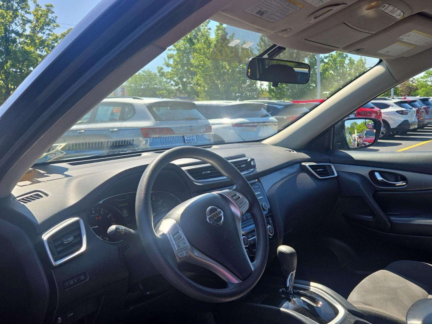 Used 2016 Magnetic Black Nissan SV image 2