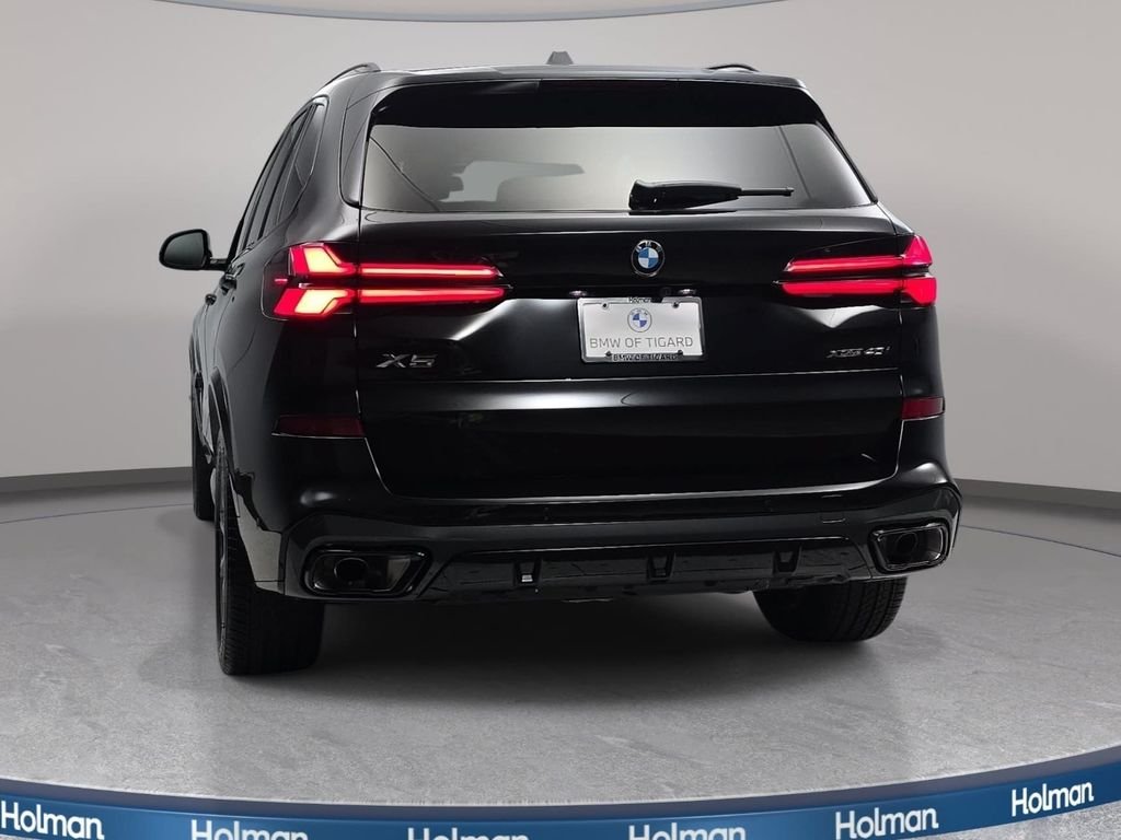 New 2026 Black Sapphire Metallic BMW xDrive40i image 6