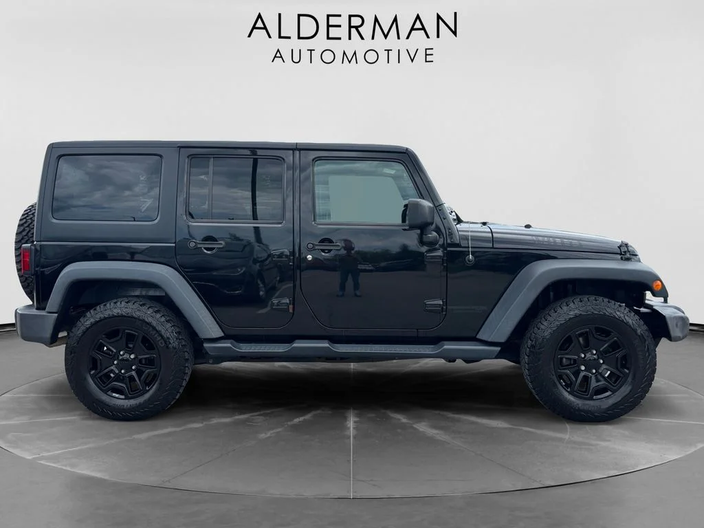Used 2018 Black Jeep Unlimited Sport image 6