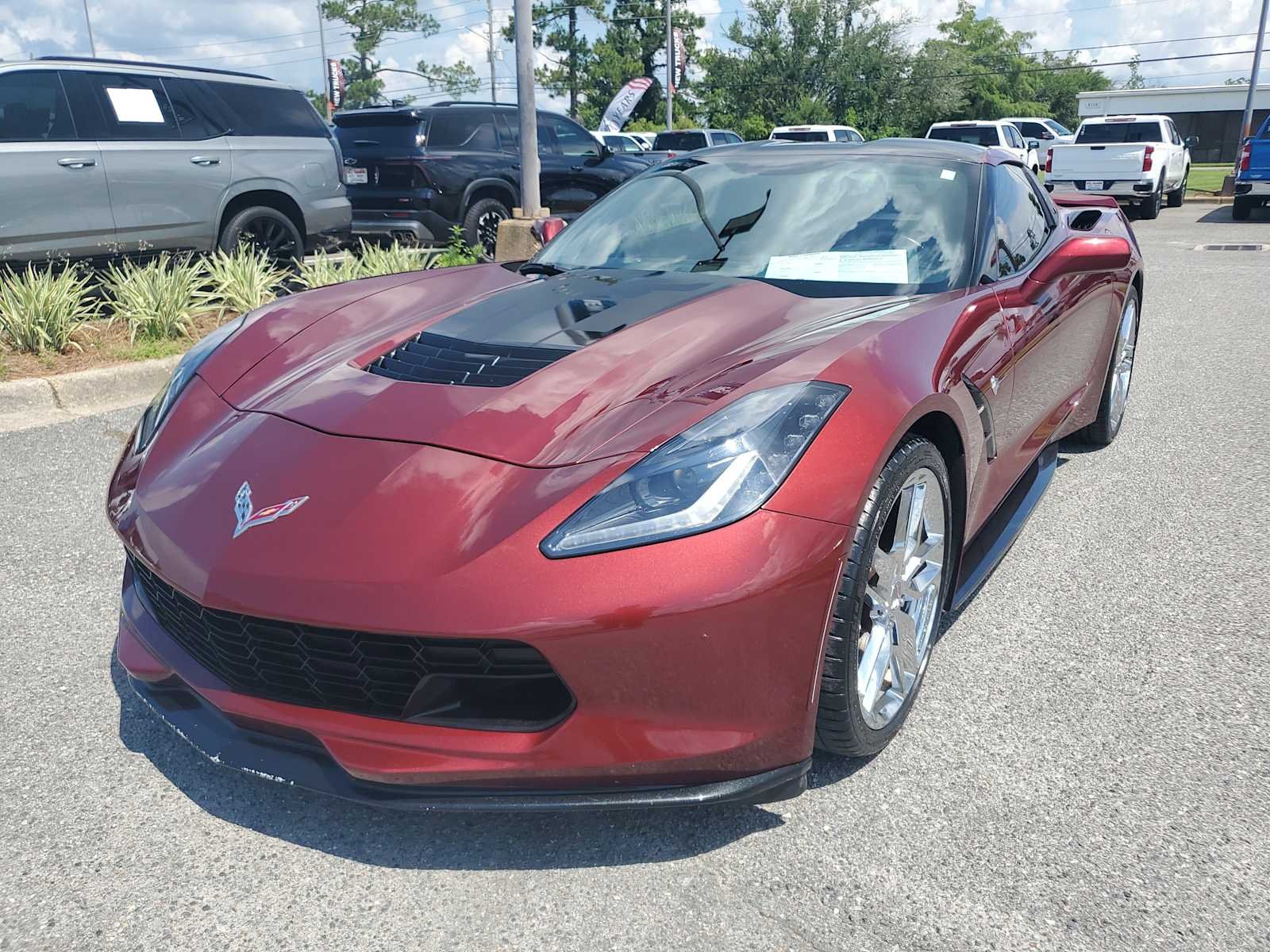 Used 2016 LONG BEACH RED METALLIC TINTCOAT Chevrolet Z51 1LT image 1