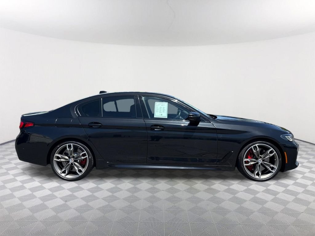 Used 2023 Black BMW M550i xDrive image 3
