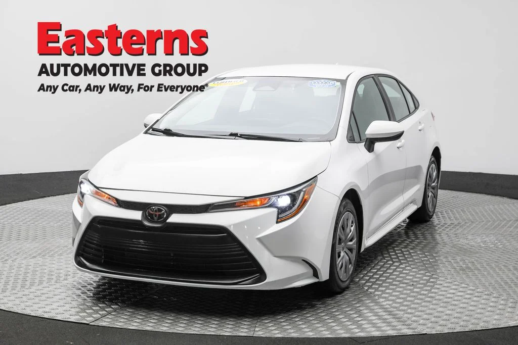 Used 2023 White Toyota LE image 1