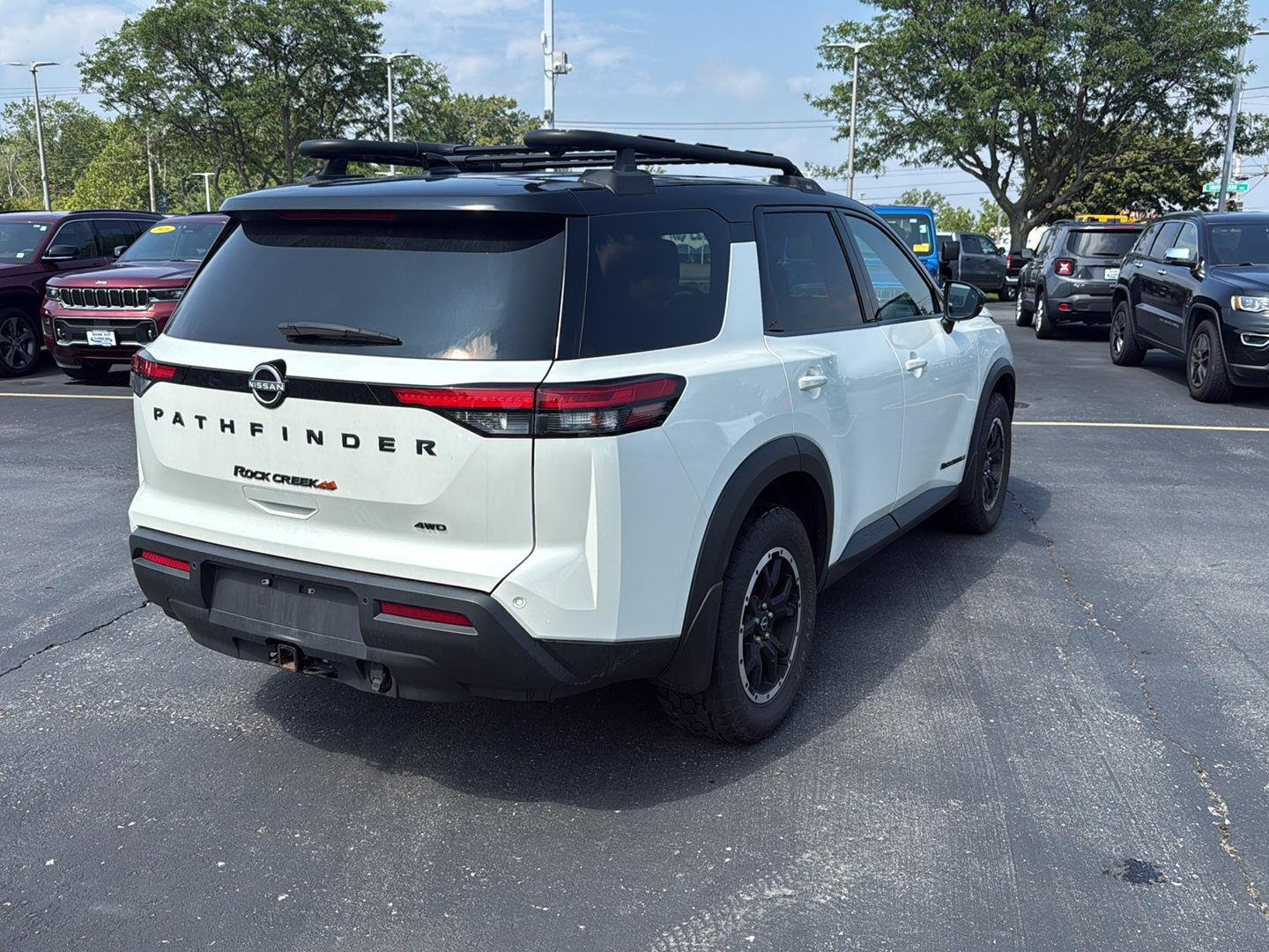 Used 2024 Pearl White Tricoat/Super Black Nissan Rock Creek image 7