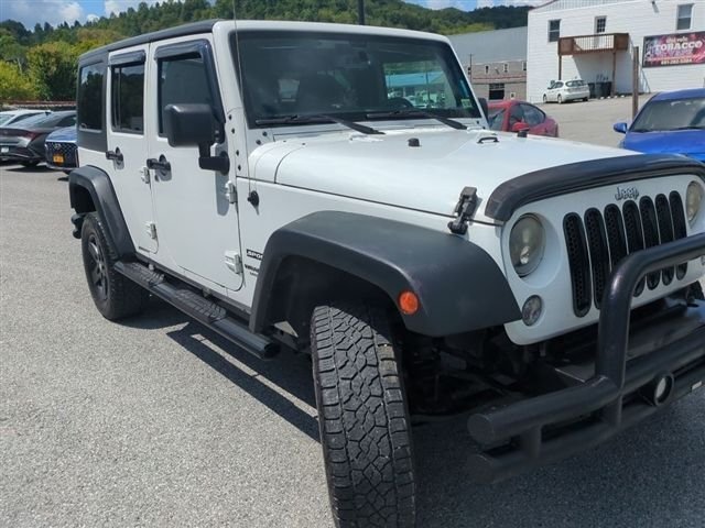 Used 2016 White Jeep Unlimited Sport image 2