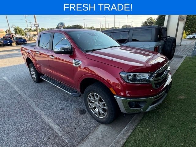 Used 2020 Red Ford Lariat image 1