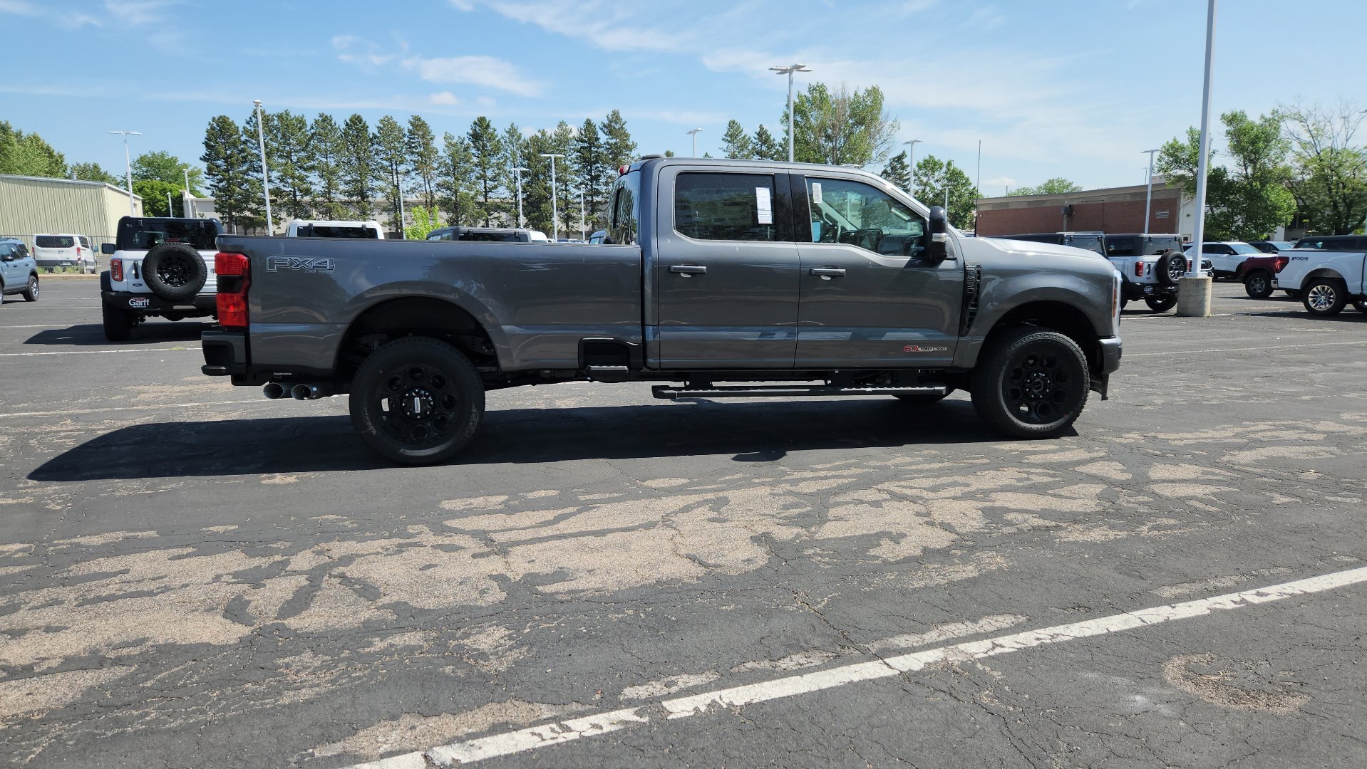 New 2026 Carbonized Gray Metallic Ford LARIAT image 17
