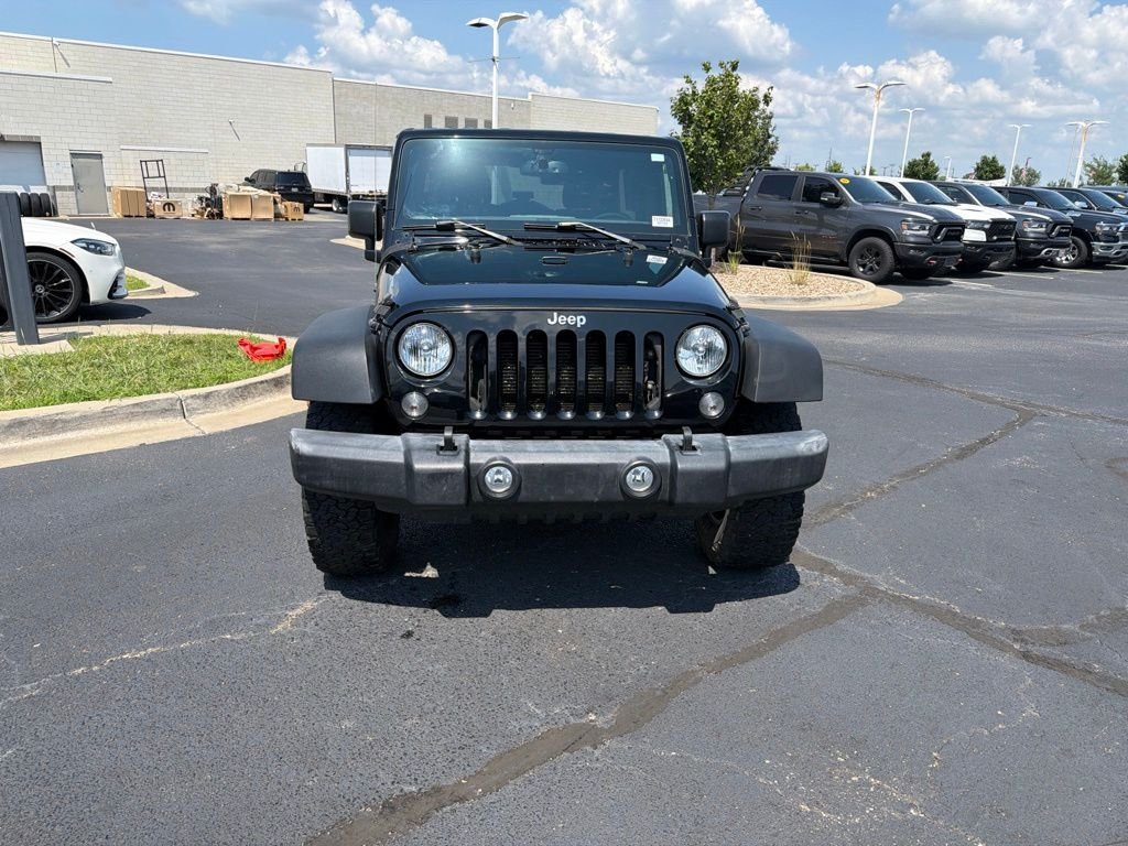 Used 2018 Black Jeep Unlimited Sport image 2