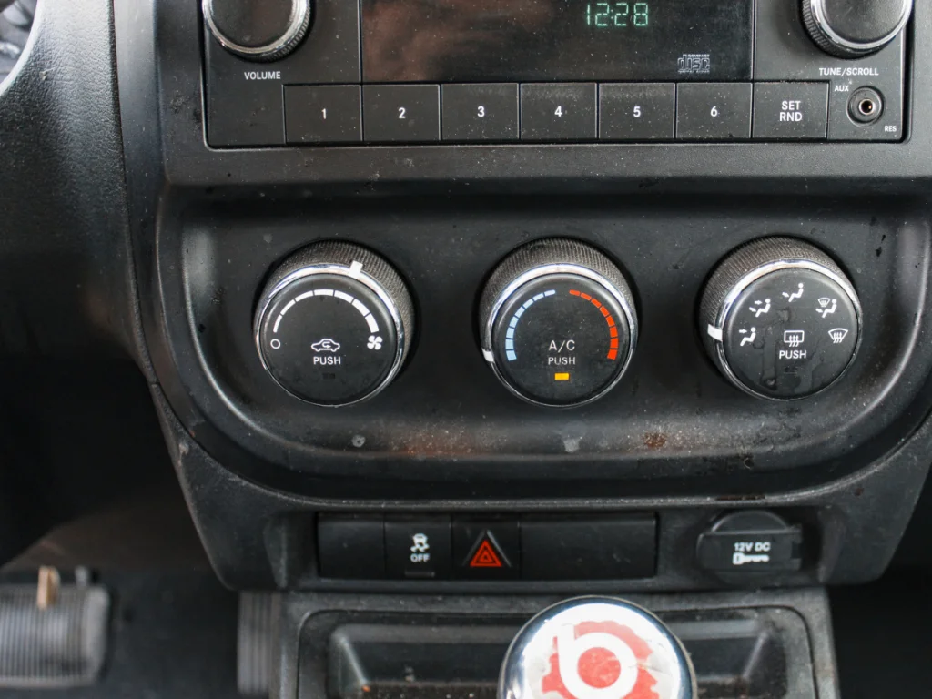 Used 2012 Bright Silver Metallic Clearcoat Jeep Sport image 14