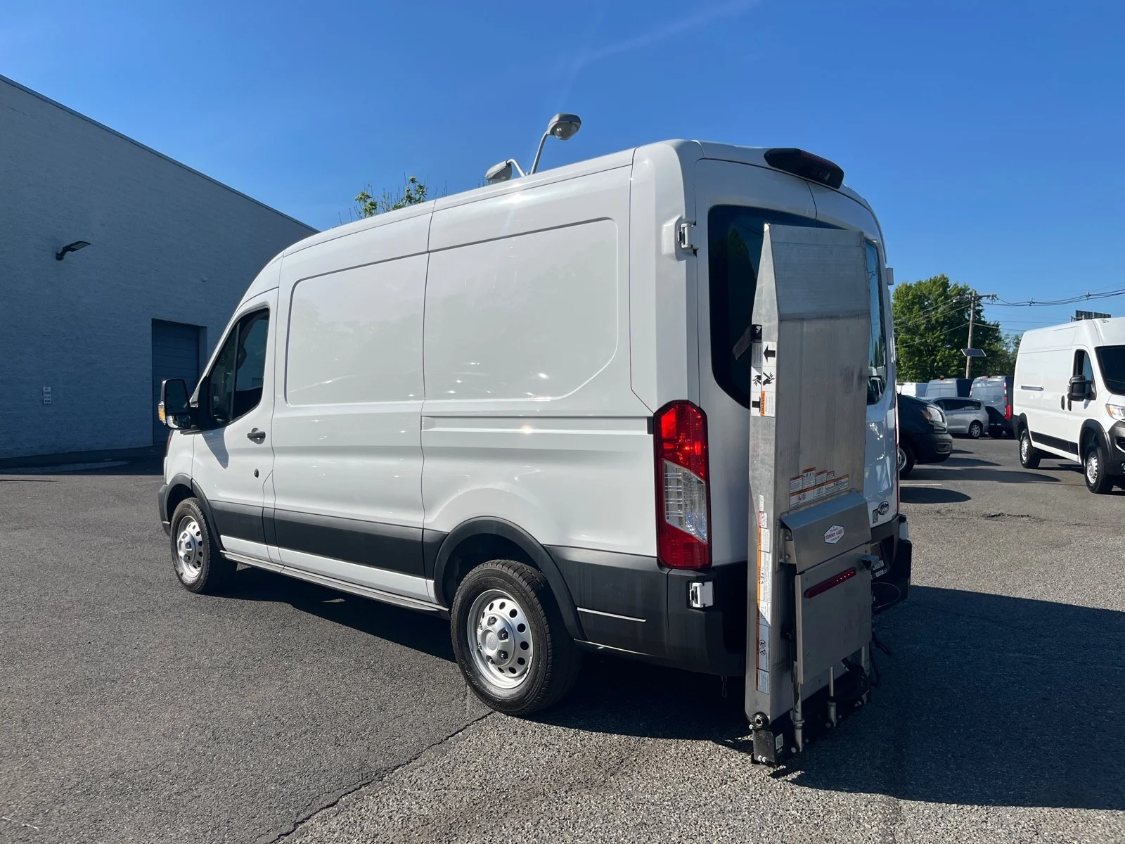 Used 2023 Oxford White Ford T250 MED ROOF AWD image 4
