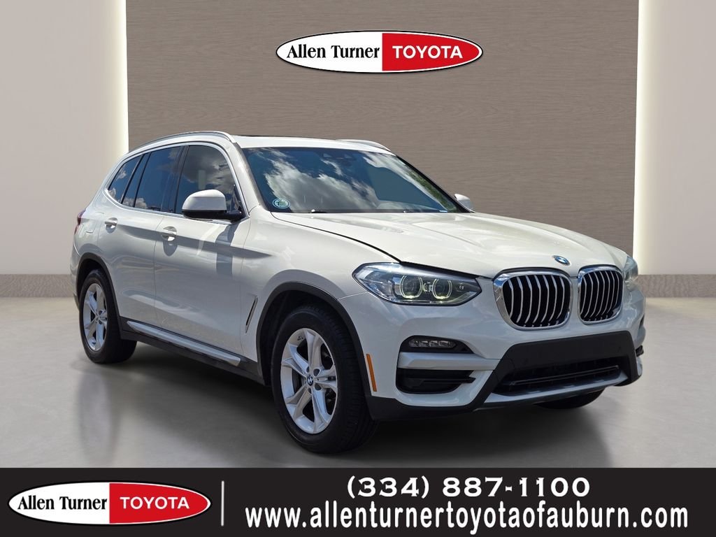 Used 2021 White BMW sDrive30i image 1