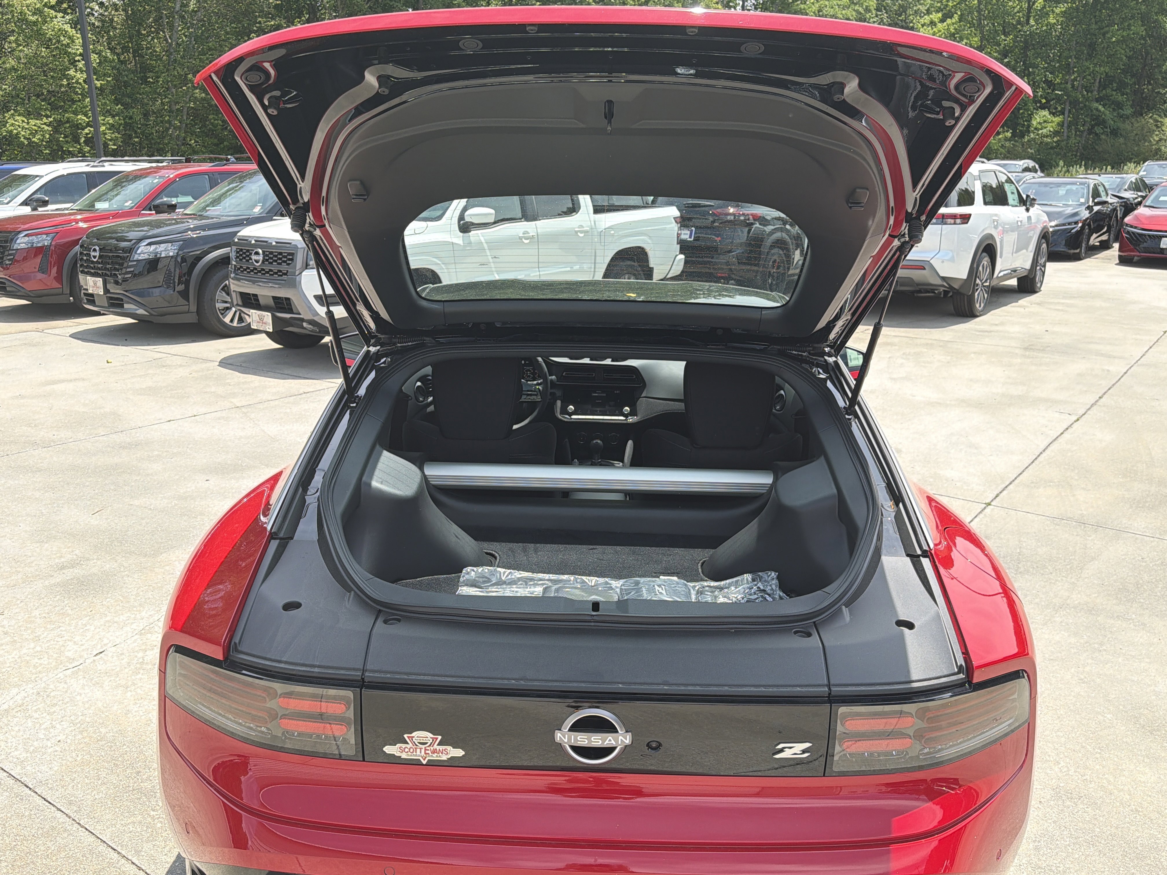 New 2026 Solid Red/Super Black Nissan Sport image 17