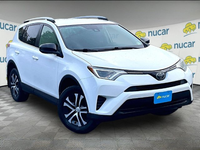 Used 2018 Super White Toyota LE image 1