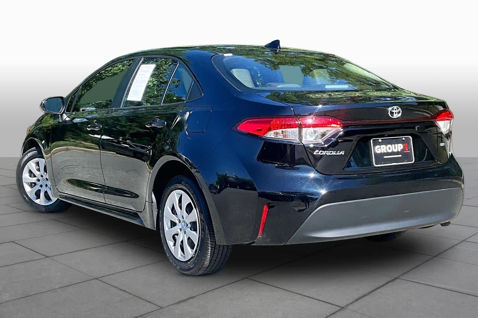 Used 2024 Midnight Black Metallic Toyota LE image 22