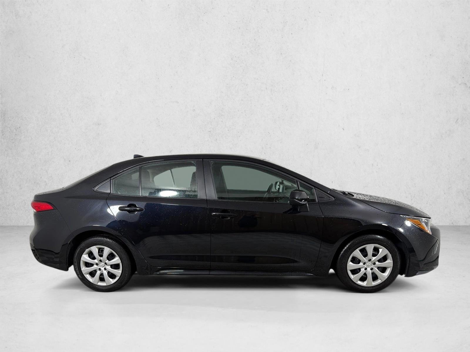 Used 2024 Midnight Black Metallic Toyota LE image 2